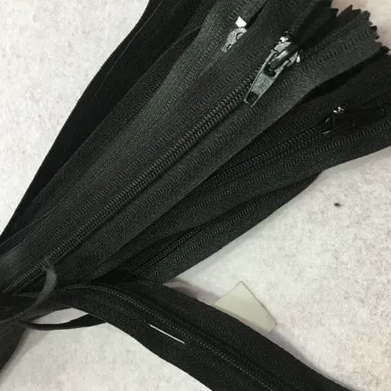 Fermoar plastic pantaloni image