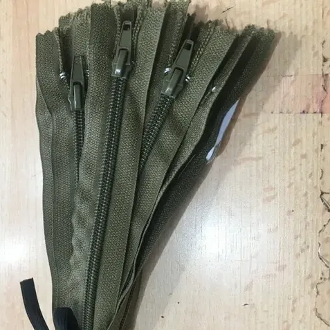 Fermoar plastic pantaloni image