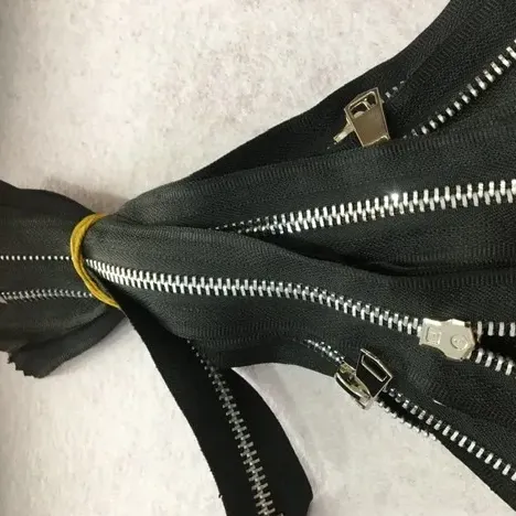 Fermoar metal pantaloni image