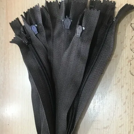 Fermoar plastic pantaloni image