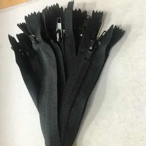 Fermoar plastic pantaloni image